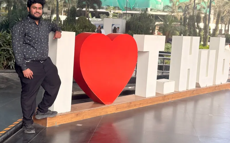 Vahini team member at the I Love T-Hub sign at T-Hub, Hyderabad